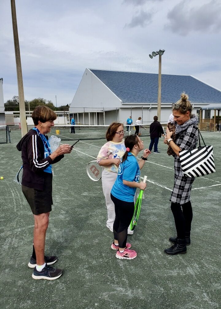 A customer of Al's Tennis Shop on the court.