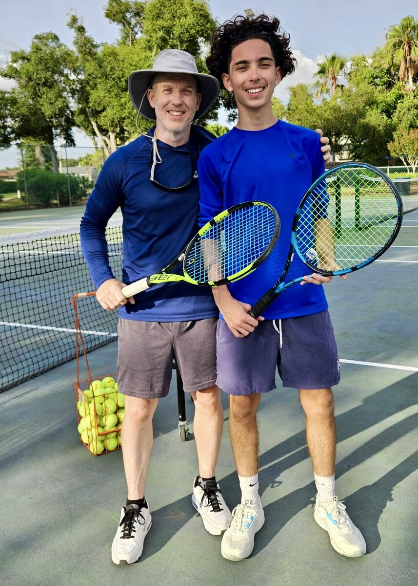 Two players together on the court after a hit.